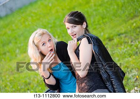 Two girlfriends shocked View Large Photo Image Stock Image - Two girlfriends shocked. Fotosearch