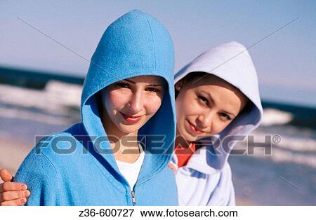 Two girls on beach View Large Photo Image Stock Photo - Two girls on beach. Fotosearch