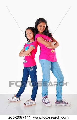 Two girls posing as models, Pune, India. View Large Photo Image Stock Image - Two girls posing as models, Pune, India.. Fotosearch