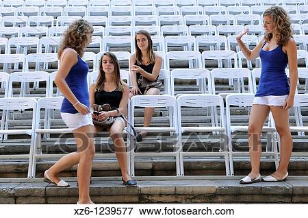 Two girls repeated in the terraces, Girona, Catalonia, Spain, Europe View Large Photo Image Stock Photo - Two girls repeated in the terraces, Girona, Catalonia, Spain, Europe. Fotosearch