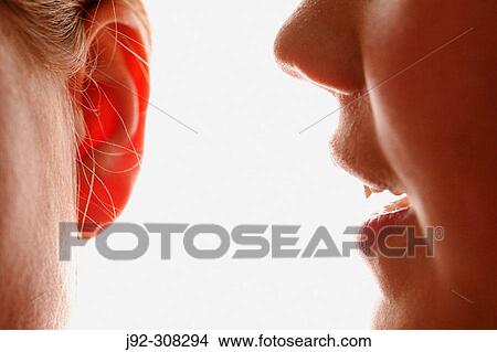 Picture - Two girls sharing secret.. Fotosearch