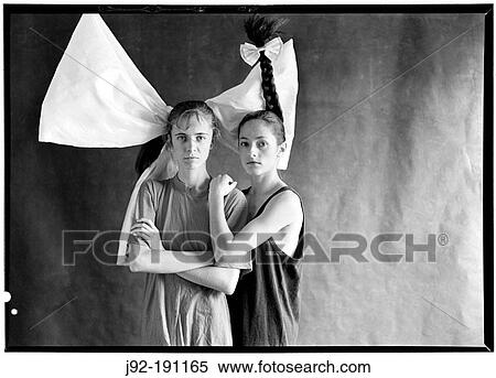 Stock Photography - Two Girls with Cockades. Fotosearch