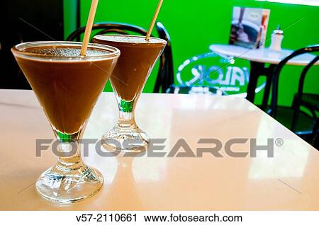 Two glasses of iced chocolate in a cafe. Madrid, Spain. View Large Photo Image Stock Image - Two glasses of iced chocolate in a cafe. Madrid, Spain.. Fotosearch