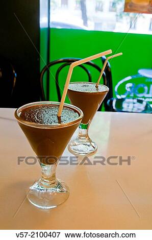 Two glasses of iced chocolate in a cafe. Madrid, Spain. View Large Photo Image Stock Photo - Two glasses of iced chocolate in a cafe. Madrid, Spain.. Fotosearch