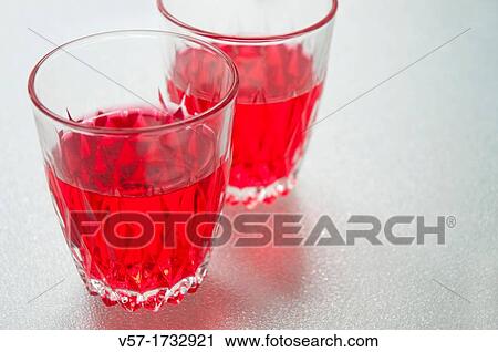 Stock Image - Two glasses of Pacharan. Fotosearch