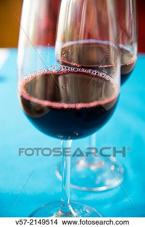 Picture - Two glasses of red wine. Close view.. Fotosearch