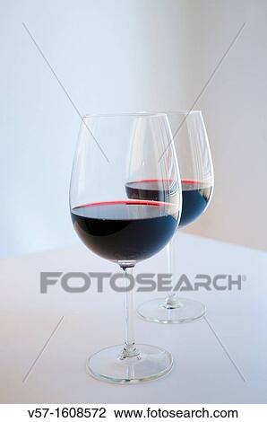 Stock Image - Two glasses of red wine. Fotosearch