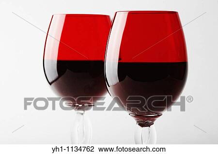 Two glasses of red wine View Large Photo Image Stock Image - Two glasses of red wine. Fotosearch