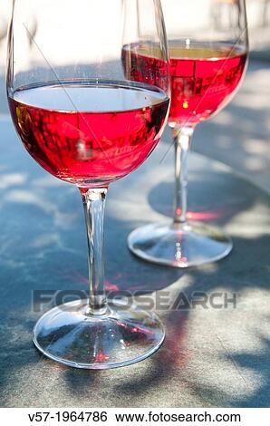 Two glasses of rose wine. View Large Photo Image Stock Photograph - Two glasses of rose wine.. Fotosearch