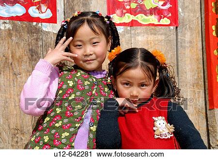 Stock Image - two happy girl. Fotosearch