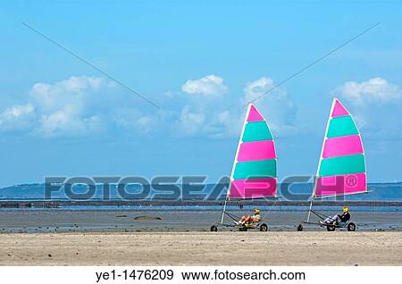 Stock Photo - Two land yachts on the beach, Brittany, France.. Fotosearch