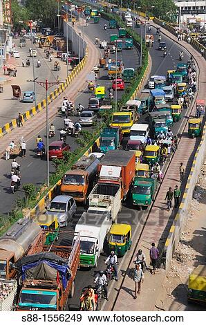 Two lane street in New Delhi View Large Photo Image Stock Photo - Two lane street in New Delhi. Fotosearch