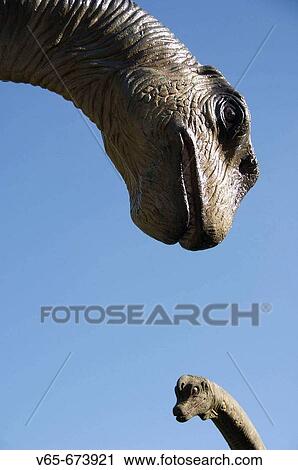 Two life size plastic artificial dinosaurs at Dan yr Ogof, the national showcaves of Wales Brecon Beacons National Park, Powys, Wales UK View Large Photo Image Stock Image - Two life size plastic artificial dinosaurs at Dan yr Ogof, the national showcaves of Wales Brecon Beacons National Park, Powys, Wales UK. Fotosearch