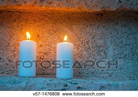 Stock Photo - Two lit candles. Concierto de las Velas, Pedraza, Segovia province, Castilla Le? n, Spain.. Fotosearch