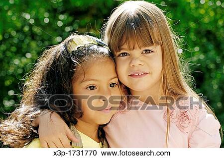 Two little girls View Large Photo Image Stock Image - Two little girls. Fotosearch