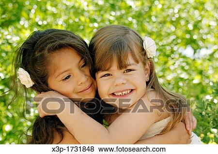 Two little girls View Large Photo Image Stock Photo - Two little girls. Fotosearch