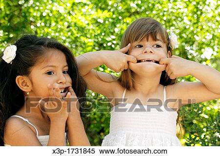Two little girls View Large Photo Image Stock Photography - Two little girls. Fotosearch