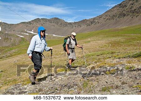 two male hikers in the Cayoosh Range of the Coast Mountains, British Columbia, Canada, near Downton Creek View Large Photo Image Stock Image - two male hikers in the Cayoosh Range of the Coast Mountains, British Columbia, Canada, near Downton Creek. Fotosearch