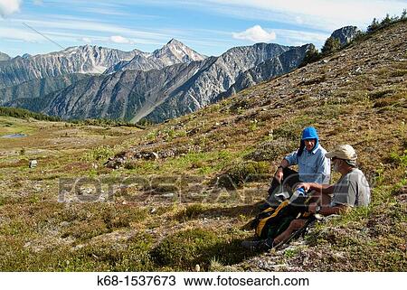 two male hikers in the Cayoosh Range of the Coast Mountains, British Columbia, Canada, near Downton Creek View Large Photo Image Stock Image - two male hikers in the Cayoosh Range of the Coast Mountains, British Columbia, Canada, near Downton Creek. Fotosearch