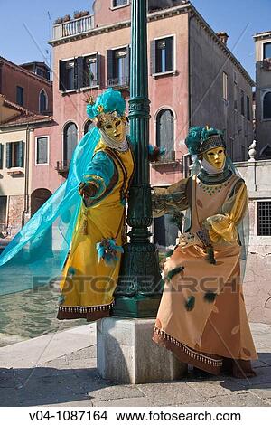Two masked women at the carnival in Venice, Italy, Europe View Large Photo Image Picture - Two masked women at the carnival in Venice, Italy, Europe. Fotosearch