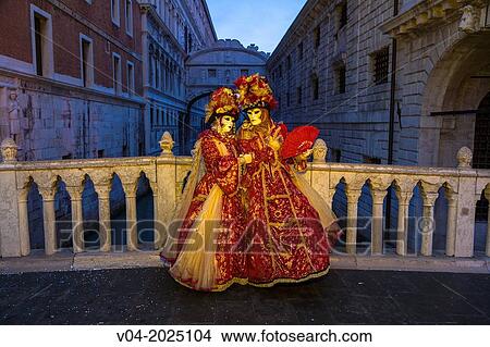 Two masked women in front of the Bridge of Sighs at the carnival in Venice, Italy, Europe View Large Photo Image Picture - Two masked women in front of the Bridge of Sighs at the carnival in Venice, Italy, Europe. Fotosearch