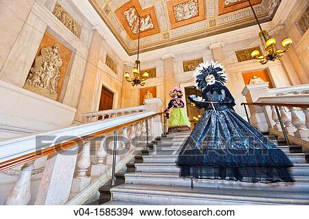 Two masked women on a staircase at the carnival in Venice, Italy, Europe View Large Photo Image Picture - Two masked women on a staircase at the carnival in Venice, Italy, Europe. Fotosearch