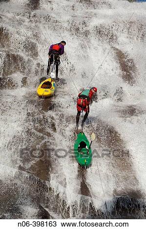 Two men rappelling down a waterfall near Lake Tahoe, California. USA View Large Photo Image Stock Image - Two men rappelling down a waterfall near Lake Tahoe, California. USA. Fotosearch