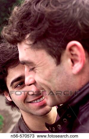 Two men smiling View Large Photo Image Stock Image - Two men smiling. Fotosearch