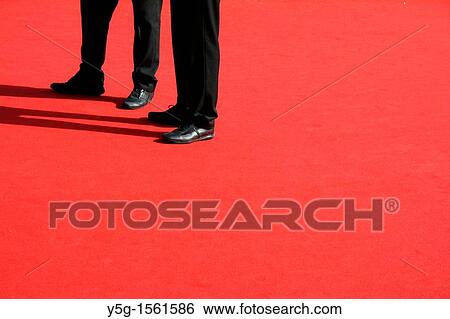 two men standing on red carpet at film festival View Large Photo Image Stock Photograph - two men standing on red carpet at film festival. Fotosearch