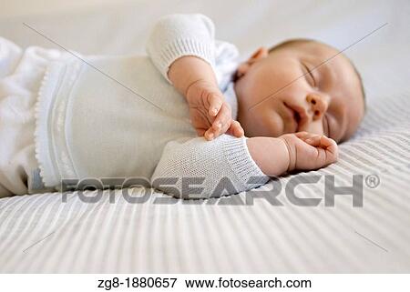 Two months old baby boy sleeping, Madrid, Spain View Large Photo Image Stock Photo - Two months old baby boy sleeping, Madrid, Spain. Fotosearch