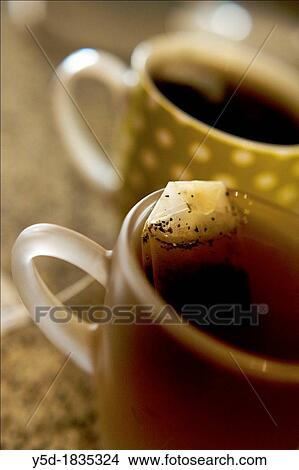 two mugs of tea View Large Photo Image Picture - two mugs of tea. Fotosearch