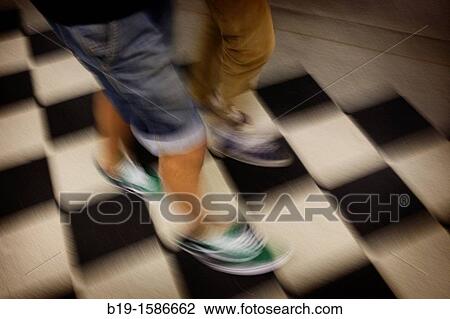 Two people walkig View Large Photo Image Stock Image - Two people walkig. Fotosearch