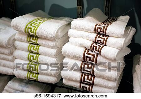 Two Stacks of Towels Displayed at a Retail Home Goods store View Large Photo Image Stock Photo - Two Stacks of Towels Displayed at a Retail Home Goods store. Fotosearch
