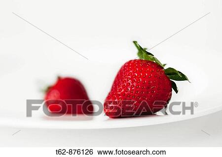Two strawberries on a plate Still Life View Large Photo Image Stock Photograph - Two strawberries on a plate Still Life. Fotosearch