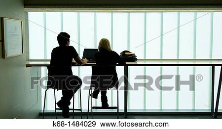 Two students study at the Langara College library building, Vancouver, BC, Canada View Large Photo Image Stock Photo - Two students study at the Langara College library building, Vancouver, BC, Canada. Fotosearch