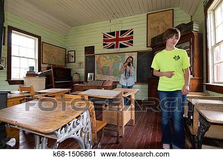 two teen girls, 15 and 17, in the old school house in the Pincher Creek museum, Pincher Creek, Alberta, Canada View Large Photo Image Stock Image - two teen girls, 15 and 17, in the old school house in the Pincher Creek museum, Pincher Creek, Alberta, Canada. Fotosearch