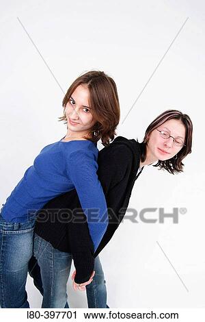 Stock Image - Two teenage girls having fun. Fotosearch