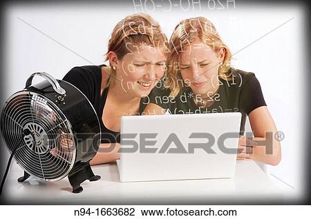 Two teenage girls studying mathematics in front of the laptop View Large Photo Image Stock Image - Two teenage girls studying mathematics in front of the laptop. Fotosearch