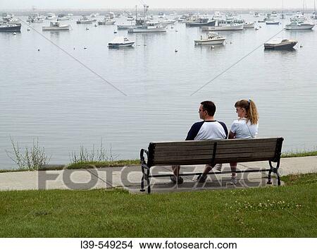 Two tourists looking out into Plymouth harbor. Massachusetts. USA. View Large Photo Image Picture - Two tourists looking out into Plymouth harbor. Massachusetts. USA.. Fotosearch
