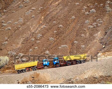 Stock Image - Two trucks, Gran Canaria, Canary Islands, Spain.. Fotosearch