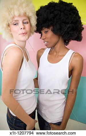 Two woman. View Large Photo Image Picture - Two woman.. Fotosearch