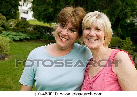 Two women friends, age 55+, Newton, Massachusetts. USA. View Large Photo Image Stock Image - Two women friends, age 55+, Newton, Massachusetts. USA.. Fotosearch