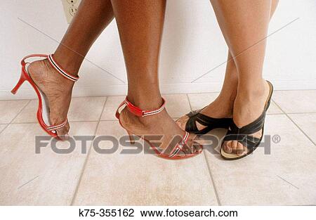 Two women in high heels View Large Photo Image Stock Image - Two women in high heels. Fotosearch