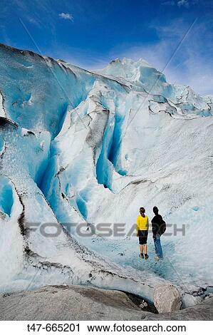 Two women in Jostedalsbreen glacier (Nigardsbreen). Sogn og Fjordane. Norway. View Large Photo Image Stock Image - Two women in Jostedalsbreen glacier (Nigardsbreen). Sogn og Fjordane. Norway.. Fotosearch