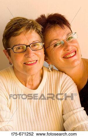 Stock Image - Two women. Fotosearch