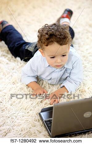 Two year old boy View Large Photo Image Stock Image - Two year old boy. Fotosearch