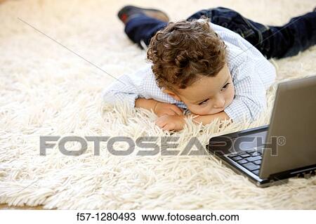 Two year old boy View Large Photo Image Stock Image - Two year old boy. Fotosearch