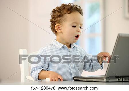Two year old boy View Large Photo Image Stock Photo - Two year old boy. Fotosearch