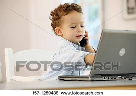 Two year old boy View Large Photo Image Stock Photo - Two year old boy. Fotosearch
