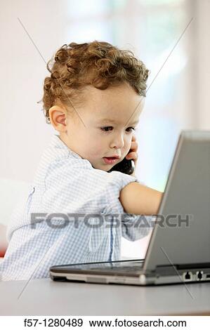 Two year old boy View Large Photo Image Stock Photo - Two year old boy. Fotosearch
